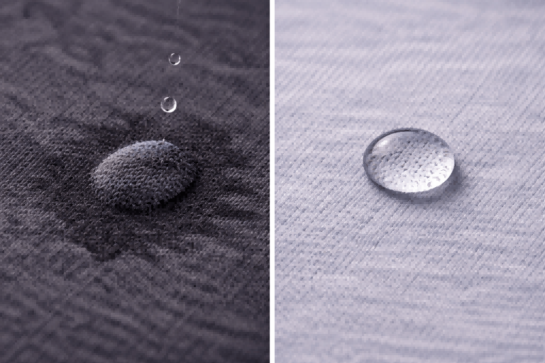 A single water drop falls on a split surface. Left dark grey cotton, the drop absorbs and spreads. Right light grey Merino wool, the drop beads up perfectly.